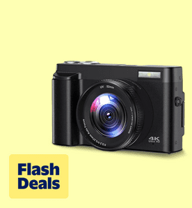 Image shows a black Actitop digital camera with a vibrant lens on a pale yellow background.