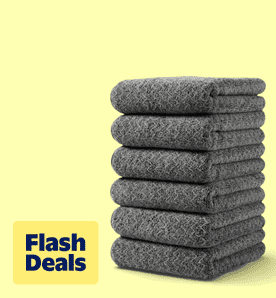 Image shows a stack of dark gray Jessy Home washcloths with a stripe design on a light yellow background.