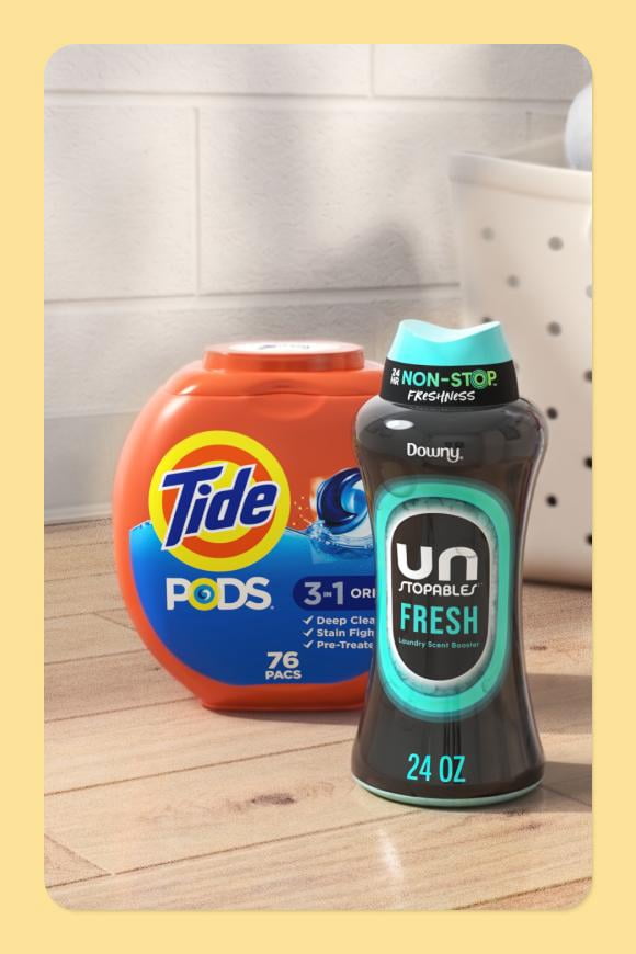 Tide detergent pods and Downy Unstoppables fresh scent booters.