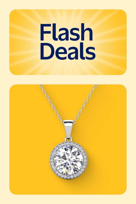 Image shows a diamond pendant on a silver chain.