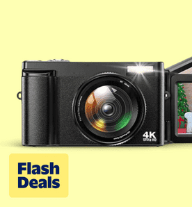 Image shows a black ACTITOP digital camera with a flip screen on a light yellow background.