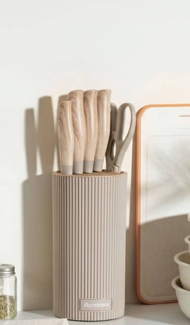 A stylish utensil container filled with spoons.