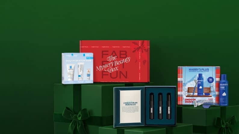 Fab Fit Fun The Mystery Beauty Box with holiday gift sets including Harrys Plus Smooth Shave and Christmas Miracle serum trio.