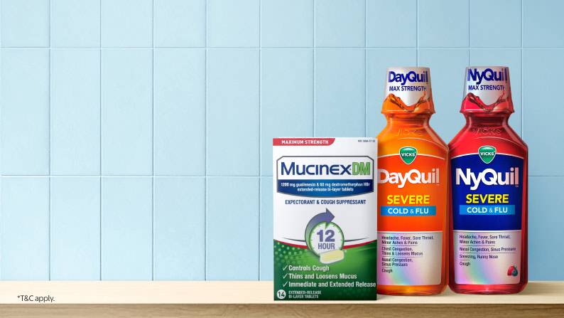 Image shows a box of Mucinex DM cough suppressant & bottles of DayQuil & NyQuil Severe Cold & Flu on a countertop.