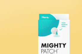 Image shows Hero Cosmetics Mighty Patch acne treatment pack with a white and teal design on a yellow background.