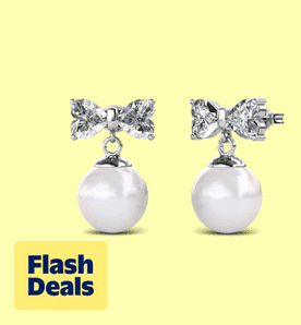Image shows white Cate & Chloe drop pearl earrings with Swarovski crystals on a pale yellow background.