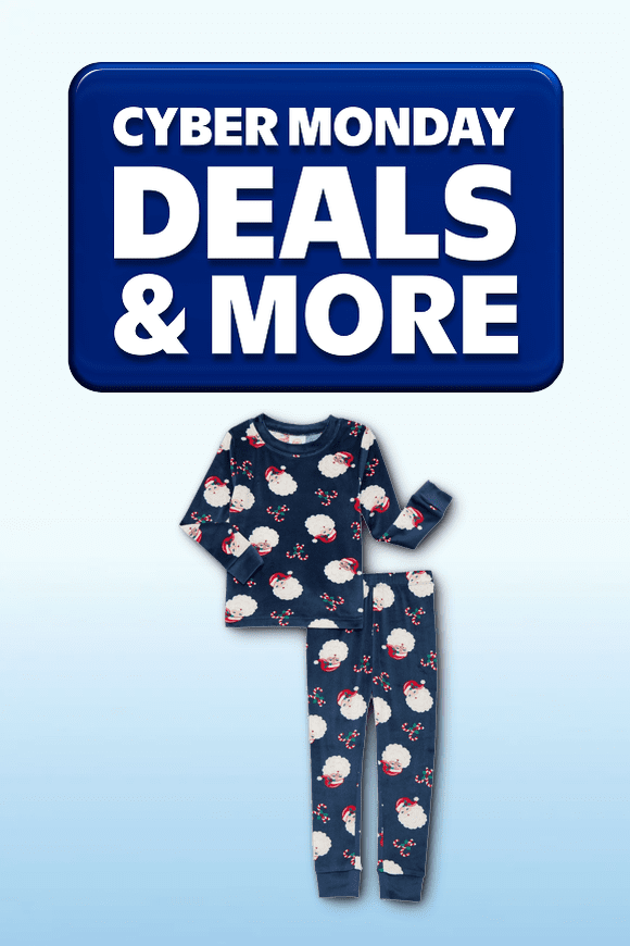 Image shows a dark blue Wonder Nation toddler pajama set with Santa patterns on a light blue gradient background.