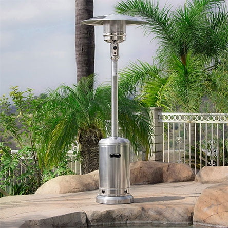 A stainless steel patio heater on an outdoor pool deck.
