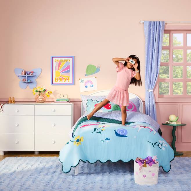 A magic-themed child’s bedroom with colorful bedding and a butterfly-shaped shelf. Bottom left corner reads: From nine dollars and seventy-six cents.