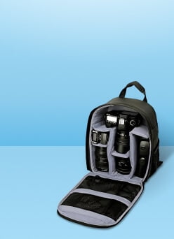 Image of a black camera back that is unzipped to show its compartments. Camera bags & straps. Shop now.