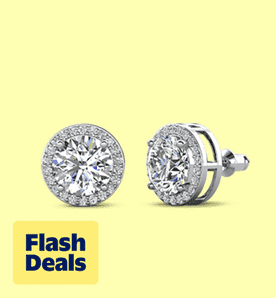 Image shows silver Cate & Chloe halo stud earrings with simulated diamonds on a pale yellow background.
