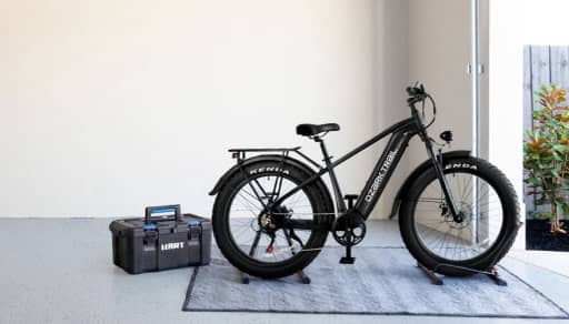 A bicycle in a garage.