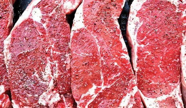 Marbled raw steaks