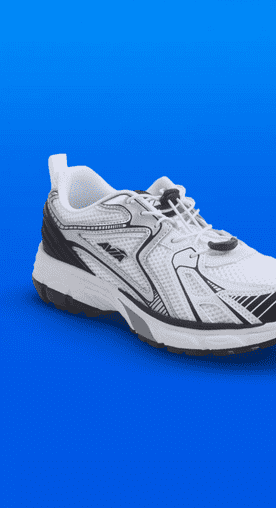 Image shows white and black Avia women's athletic sneakers on a blue background.