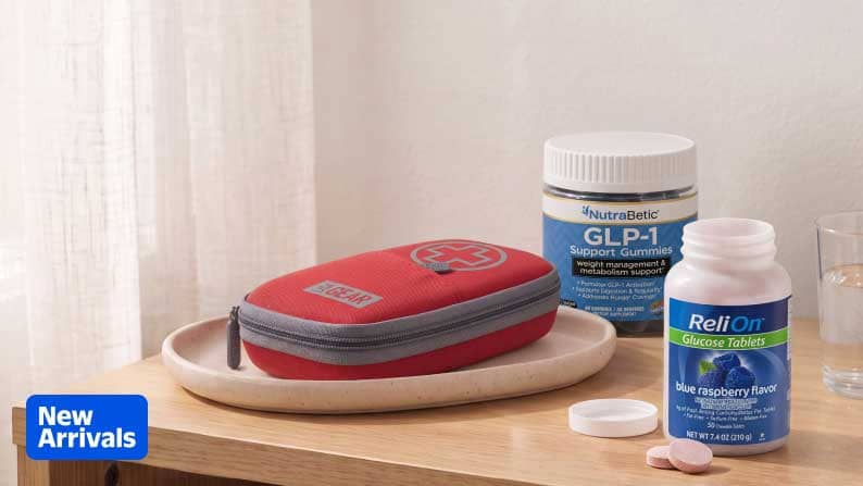 New Arrivals badge. NutraBetic GLP one support gummies and ReliOn glucose tablets with a red medical case on a wooden tray.