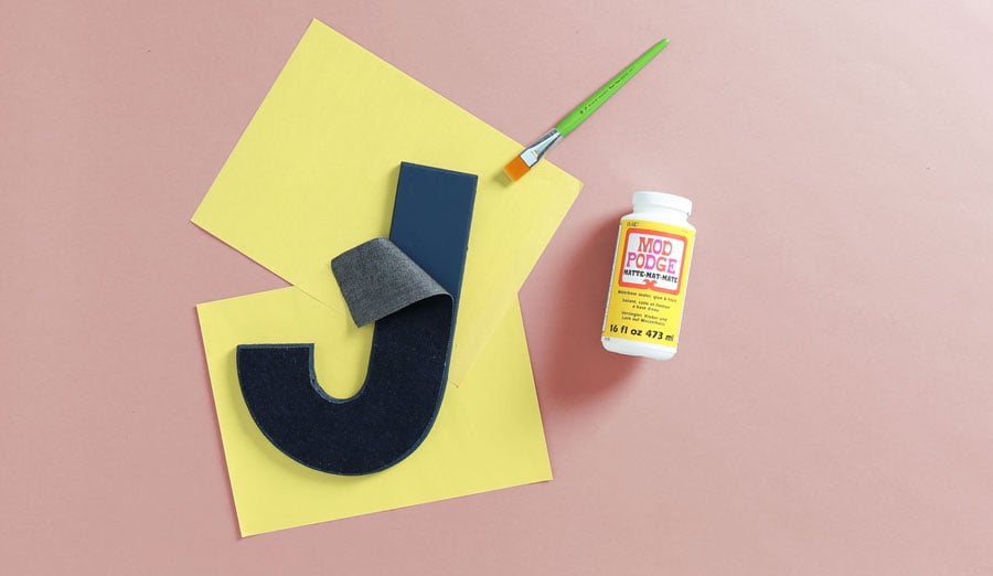 apply mod podge to painted letter