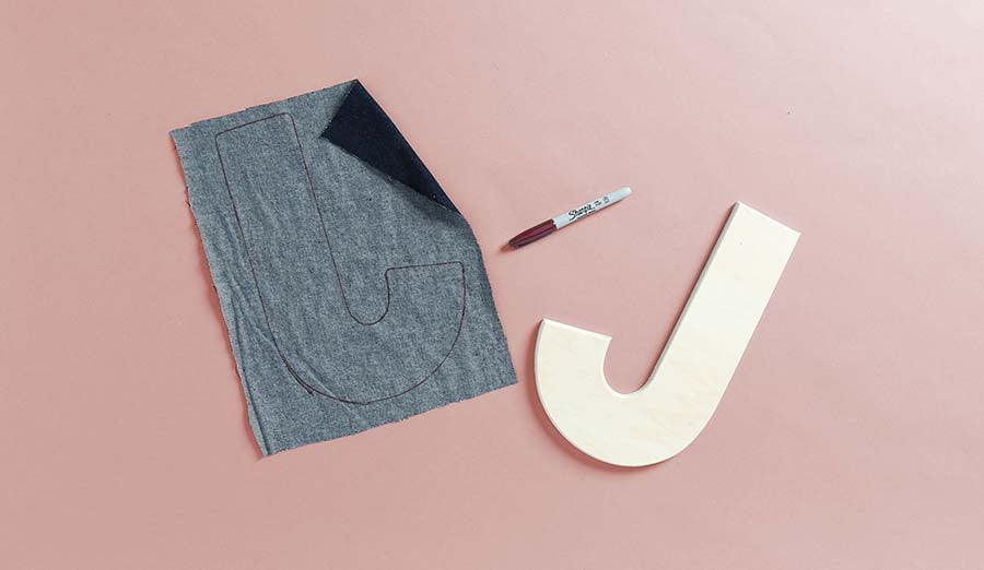 traced letter on fabric