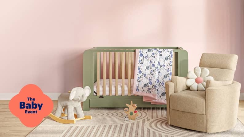 The Baby Event badge. A nursery is decorated with a plush reclining chair with a flower throw pillow, two-tone crib, and rocking horse toy.