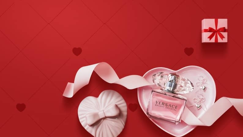 Drinking glasses, roses, sweater, cake, chocolate-covered strawberries, plate and Nerds.