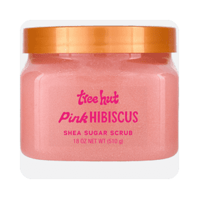 Image shows a pink jar of Tree Hut Pink Hibiscus Shea Sugar Scrub with an orange lid, designed for hydrating and exfoliating the skin.