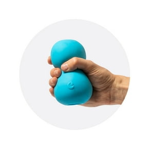 Hand squeezing a Hello Cake massager.