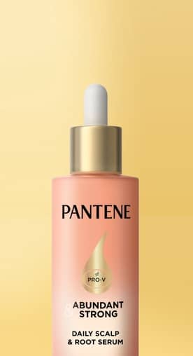 Yellow banner with hair serum and text: Scalp care for healthy hair. Shop now.