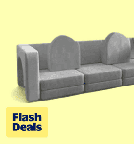 Image shows a grey modular Linor toddler sofa with play archways, featuring a toy and a white bunny, on a light yellow background.