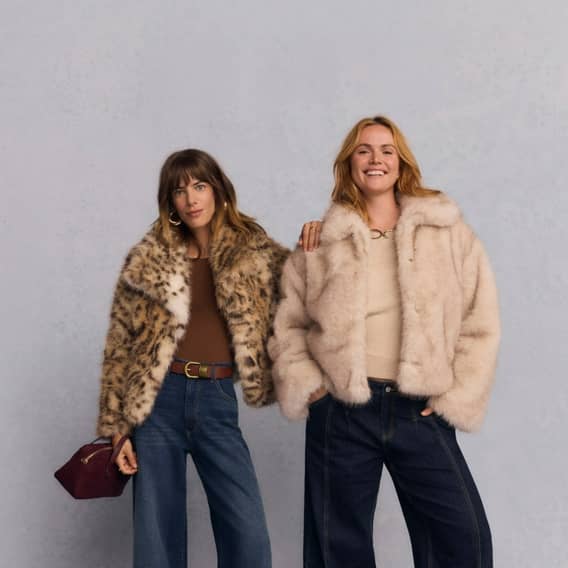 Two women are shown. One wears Jessica Simpson round collar faux fur leopard print jacket. The other wears Time and Tru plush faux fur ivory jacket.
