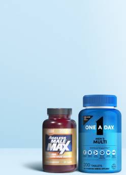Supplement of men’s multivitamins on a light blue background.