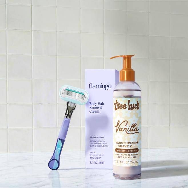 Shaving products in a bathroom setting.