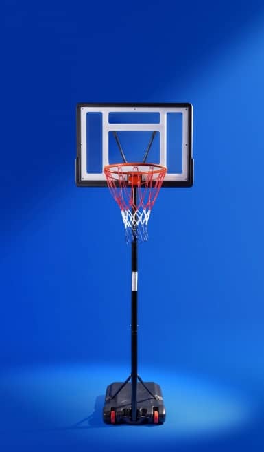 Portable basketball hoop with clear backboard, orange rim and wheeled base.
