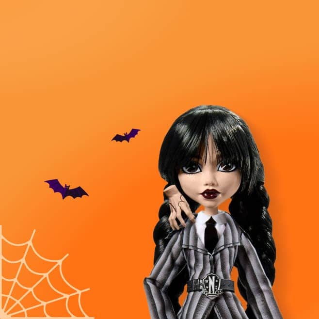 Wednesday doll shown along with bats and cobwebs.