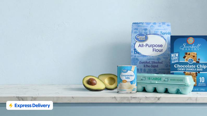 Express Delivery. A sliced avocado, a can of evaporated milk, a bag of all-purpose flour, a carton of eggs and a box of chocolate chip granola bars.