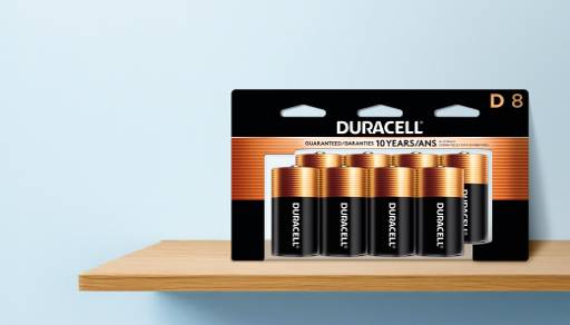 An Equate first aid kit is shown with batteries and a flashlight.