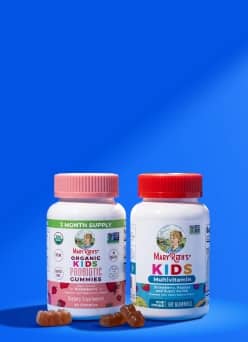 MaryRuths kids probiotic gummies and kids multivitamin bottles with gummy pieces in front.