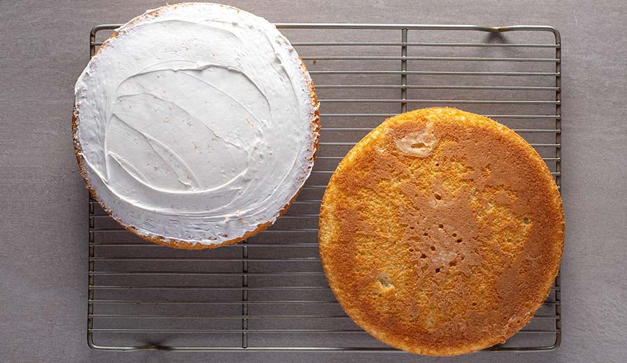 Step 1 bake and cool cake, thinly frost one side