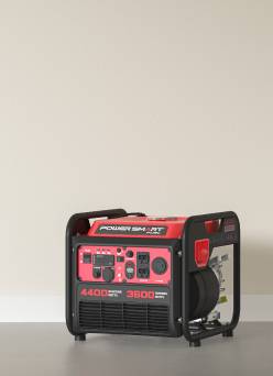 An image of a black generator on a grey background.