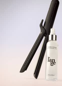 Image of a hair tool and haircare product is shown.