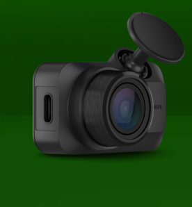 Image shows a black Garmin Dash Cam Mini 3 on a green background.