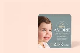 Pampers Amore diapers box with smiling baby, size four, fifty eight diapers, fine of fragrance, soft and cashmere.
