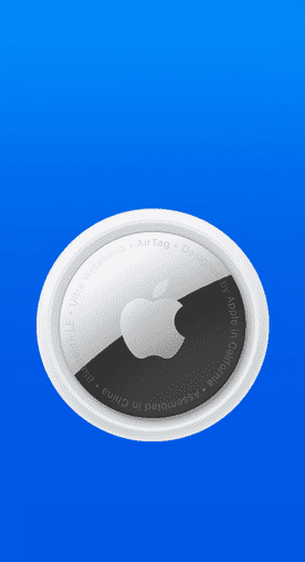 Image shows a silver and black Apple AirTag on a blue background.