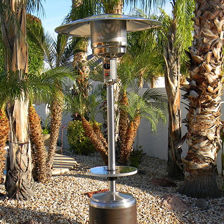 A standing patio heater in a backyard. Links to the best standing patio heaters on Walmart.com.