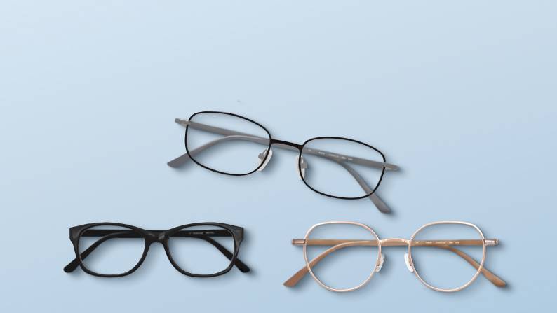 Three pairs of glasses with tan, black & steel-colored frames.