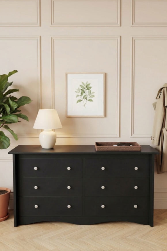 A stylish dark wood bedroom dresser.