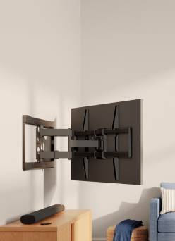 An onn TV mount supporting a television.
