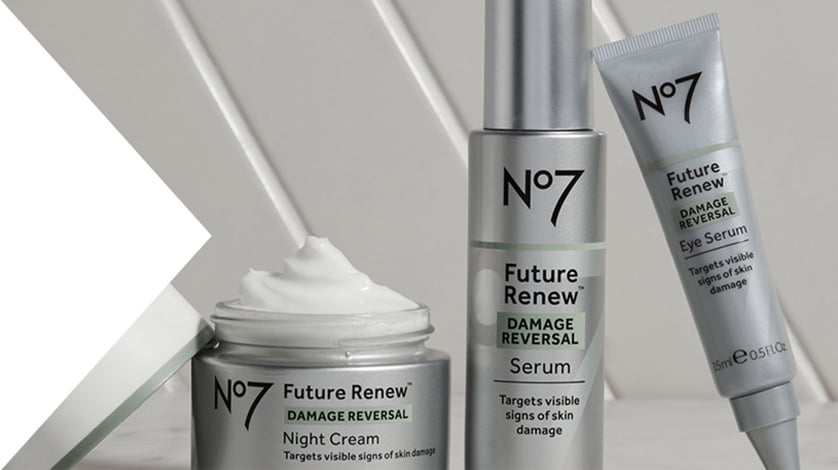 Dark grey bottles and jars of future renew products leaning on one another