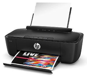 HP-AMP-Printer-with-speaker HP AMP 100 printer - a black printer with white paper in the feeder tray and a brightly colored page being printed - HP AMP also includes a bluetooth speaker on the top of the printer