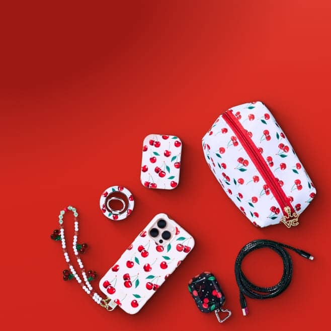 Image shows a set of phone accessories including a case, charger, battery backup and a bag in a matching cherry print design.