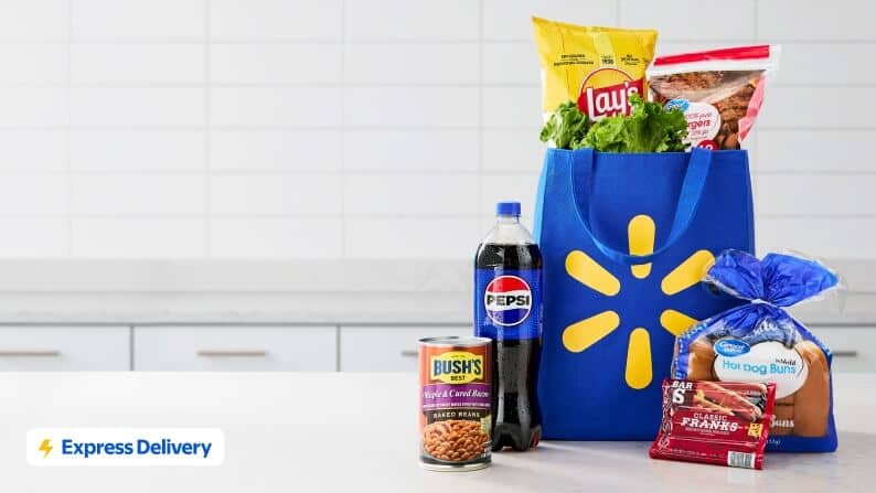 Express Delivery. A Walmart bag, Busch’s baked beans, Pepsi, Great Value hot dog buns, Bar S franks, Lay’s potato chips, and Great Value burgers.