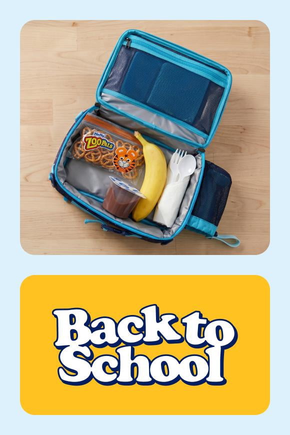 Back to school banner. A packed lunch box, Ziploc bags and a sandwich stored in a plastic baggie is shown.